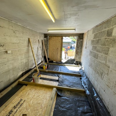 photo seven of construction begins inside the garage of Beat To Keep Record Shop Mortehoe, Woolacombe, Devon opening summer 2025. Selling new and second hand vinyl and music plus barista coffee and local baked goods, bread, sour dough, buns, sweet treats from Crocodile Bakery.